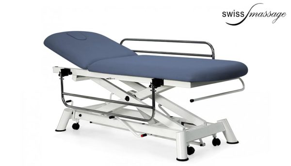 Medical treatment table with safety rails with raised backrest