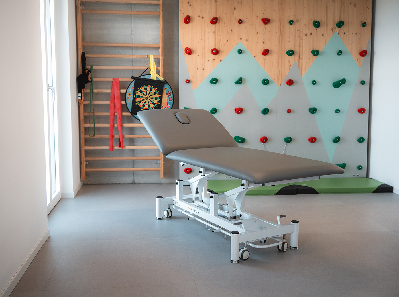 Table de physiothérapie électrique conçue pour les physiothérapeutes et les kinés